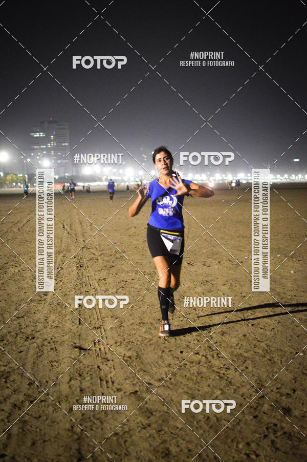 Buy your photos of the eventJovem Pan Night Run Santos on Fotop