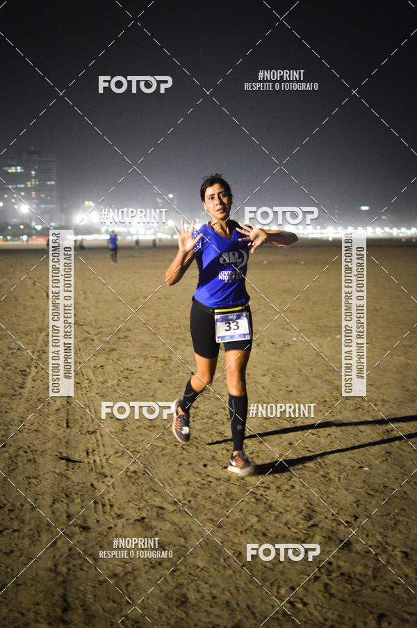 Buy your photos of the eventJovem Pan Night Run Santos on Fotop