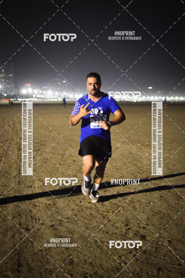 Buy your photos of the eventJovem Pan Night Run Santos on Fotop