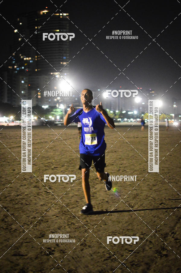Buy your photos of the eventJovem Pan Night Run Santos on Fotop