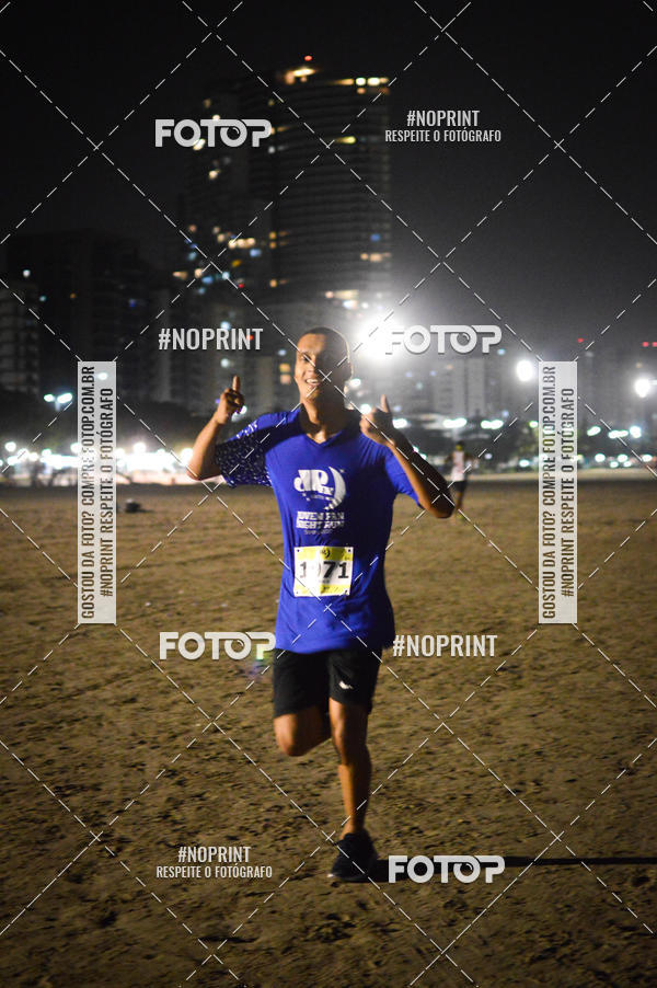 Buy your photos of the eventJovem Pan Night Run Santos on Fotop