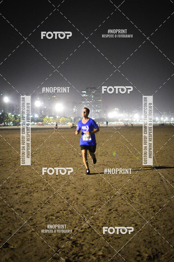 Buy your photos of the eventJovem Pan Night Run Santos on Fotop
