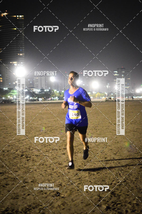 Buy your photos of the eventJovem Pan Night Run Santos on Fotop