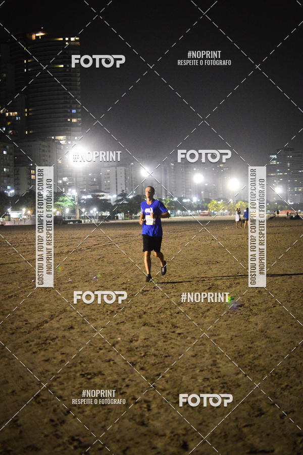 Buy your photos of the eventJovem Pan Night Run Santos on Fotop