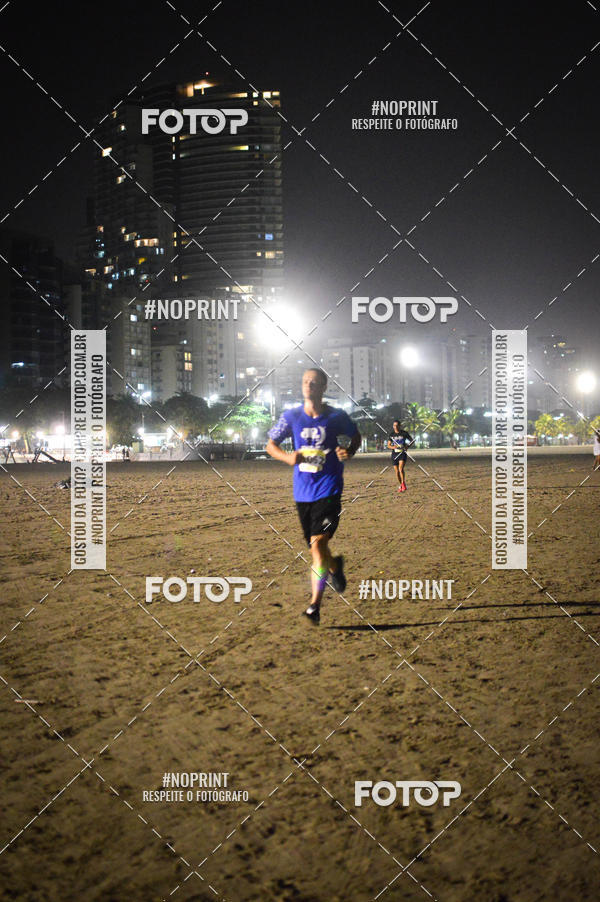Buy your photos of the eventJovem Pan Night Run Santos on Fotop