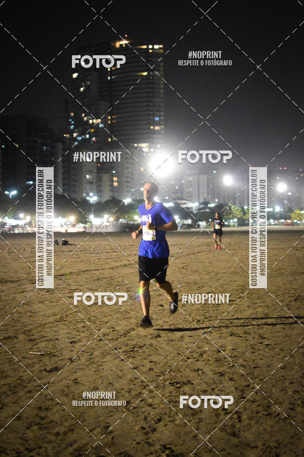 Buy your photos of the eventJovem Pan Night Run Santos on Fotop