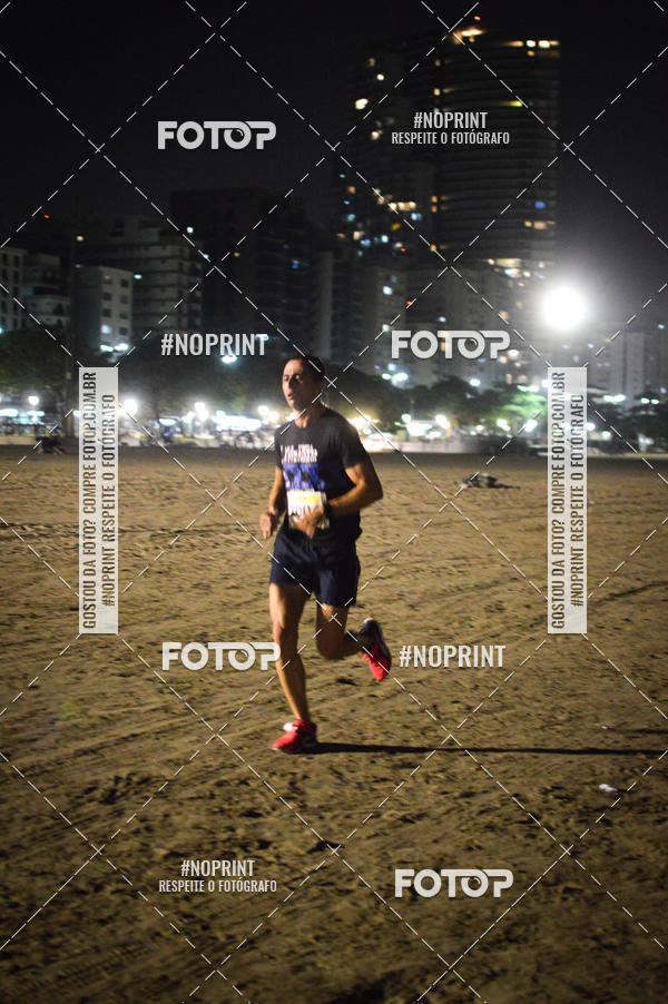 Buy your photos of the eventJovem Pan Night Run Santos on Fotop