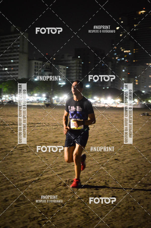Buy your photos of the eventJovem Pan Night Run Santos on Fotop