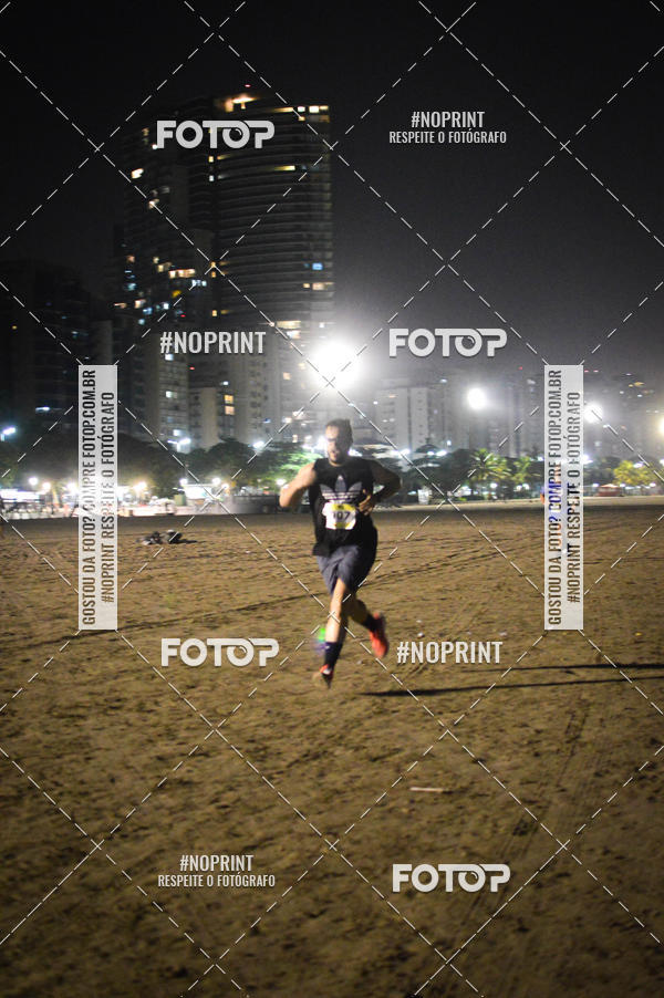 Buy your photos of the eventJovem Pan Night Run Santos on Fotop