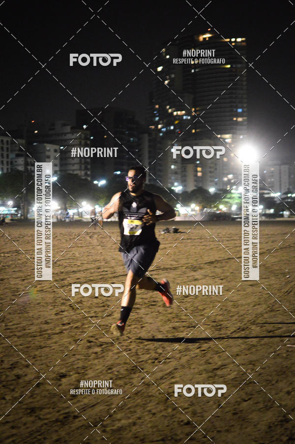 Buy your photos of the eventJovem Pan Night Run Santos on Fotop