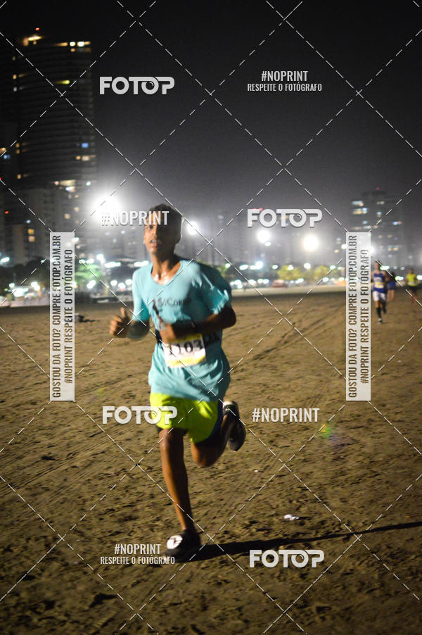 Buy your photos of the eventJovem Pan Night Run Santos on Fotop