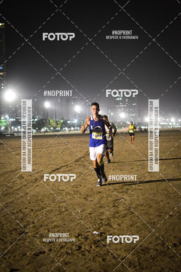 Buy your photos of the eventJovem Pan Night Run Santos on Fotop