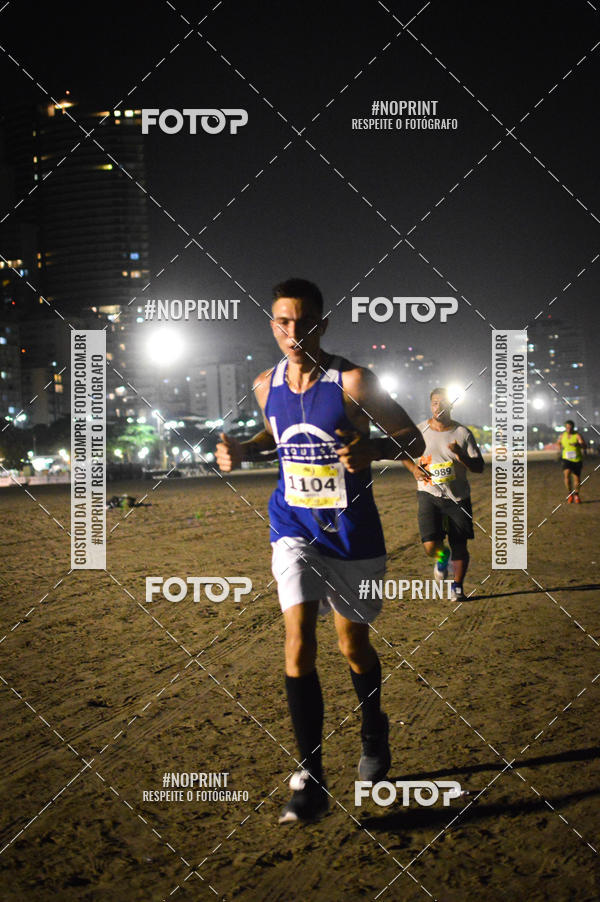 Buy your photos of the eventJovem Pan Night Run Santos on Fotop