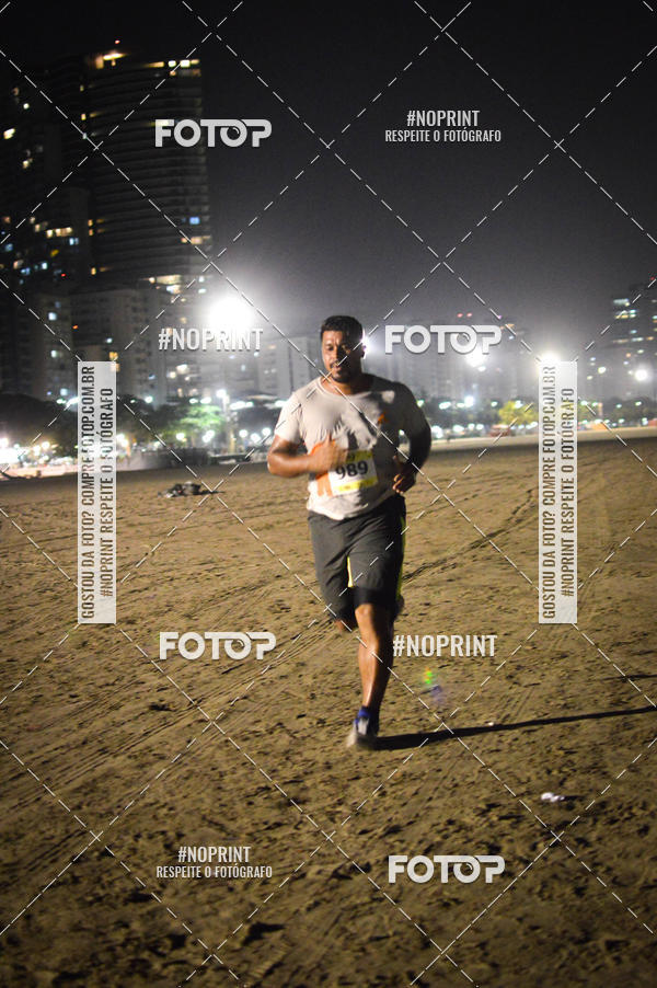 Buy your photos of the eventJovem Pan Night Run Santos on Fotop