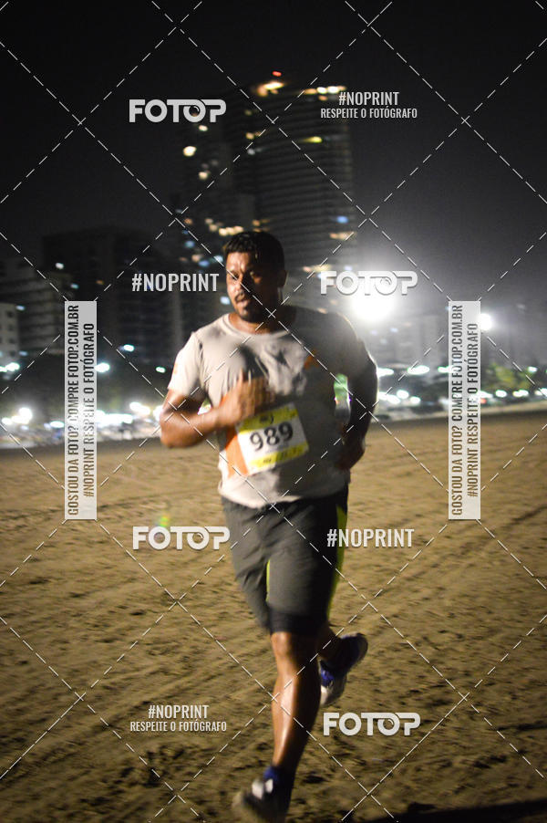 Buy your photos of the eventJovem Pan Night Run Santos on Fotop