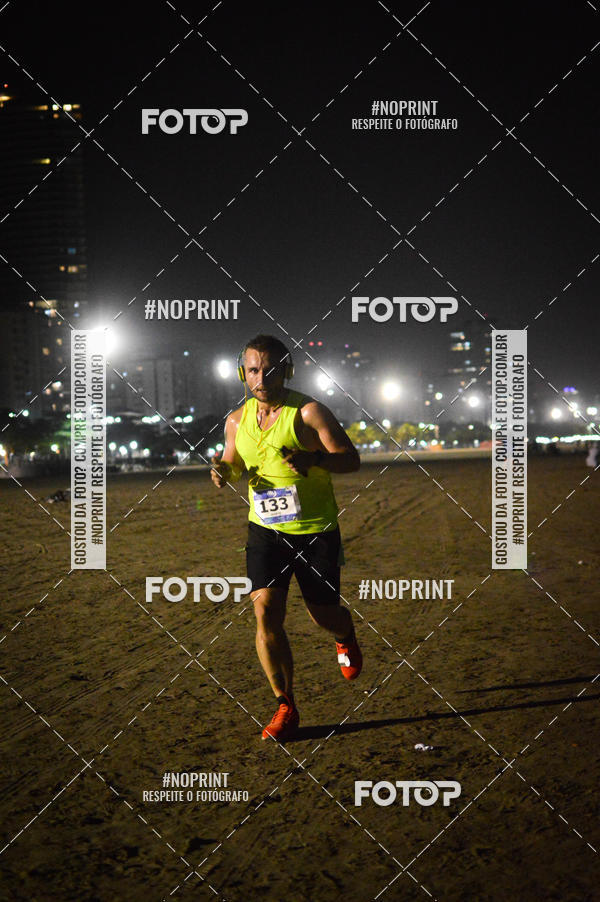 Buy your photos of the eventJovem Pan Night Run Santos on Fotop