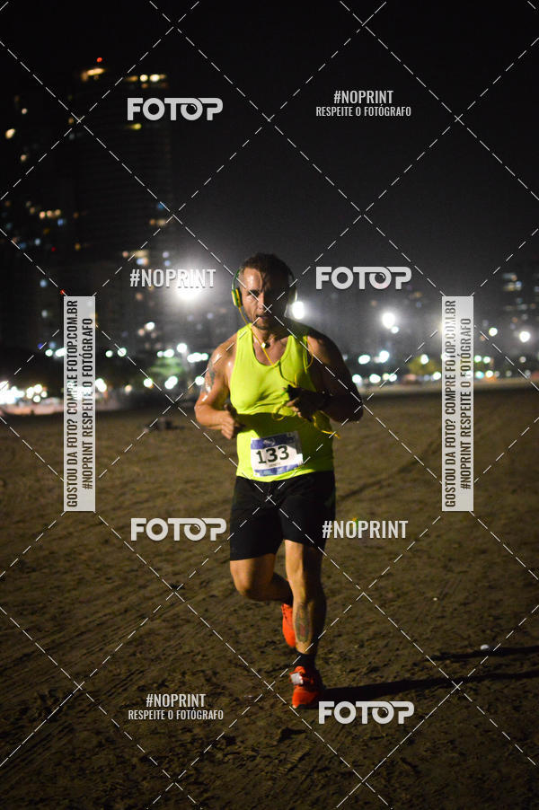 Buy your photos of the eventJovem Pan Night Run Santos on Fotop