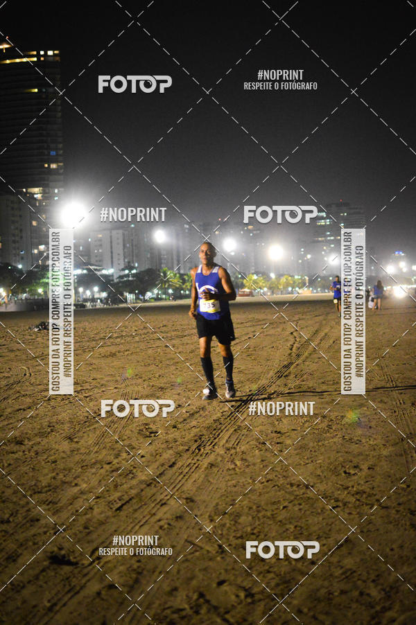 Buy your photos of the eventJovem Pan Night Run Santos on Fotop