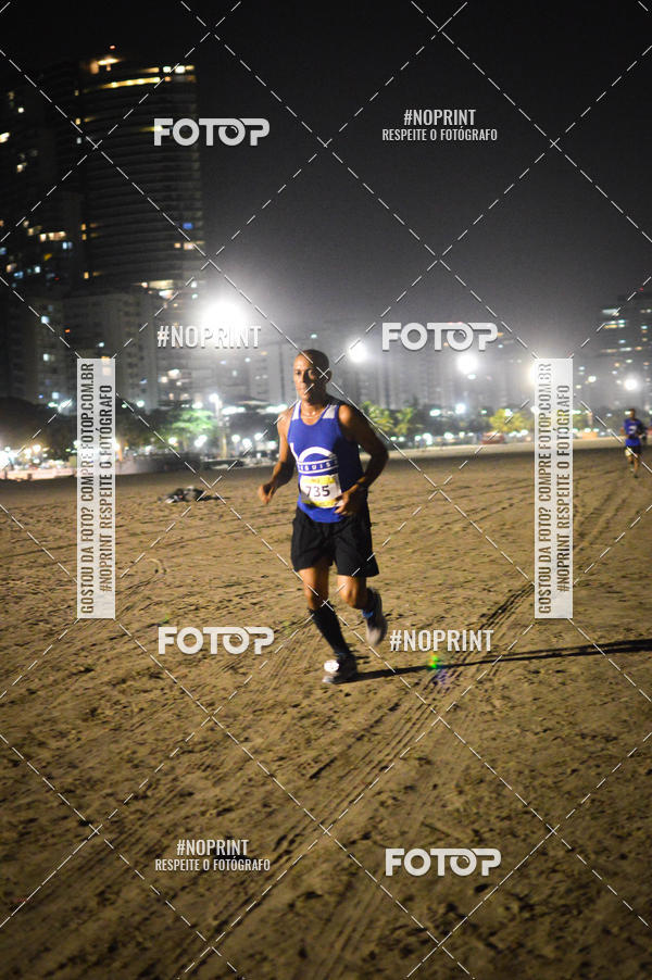 Buy your photos of the eventJovem Pan Night Run Santos on Fotop