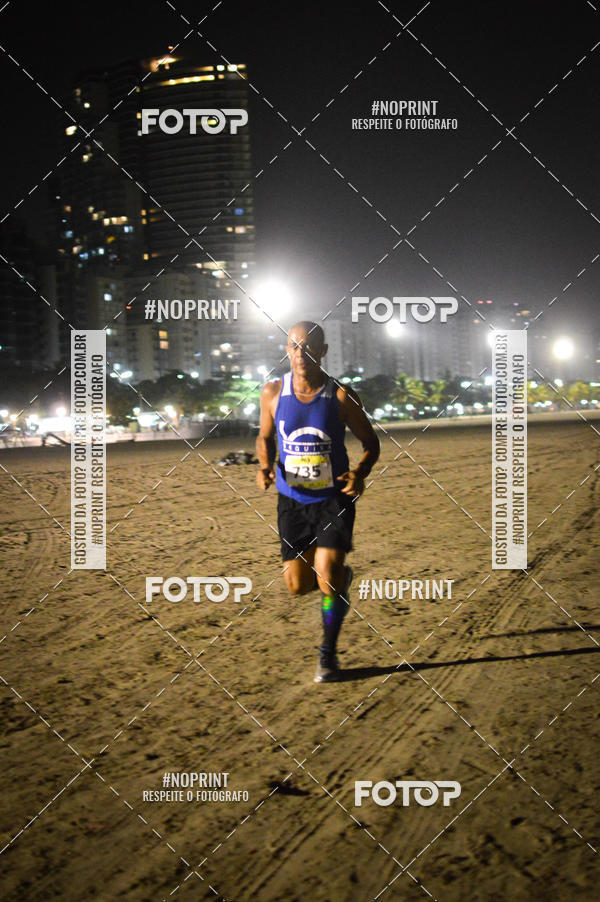Buy your photos of the eventJovem Pan Night Run Santos on Fotop