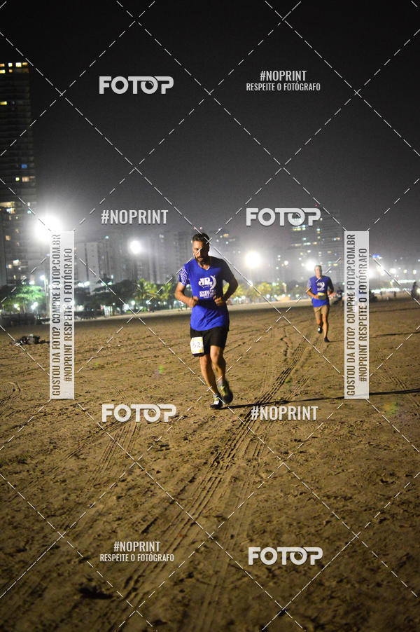 Buy your photos of the eventJovem Pan Night Run Santos on Fotop