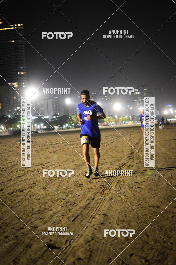 Buy your photos of the eventJovem Pan Night Run Santos on Fotop