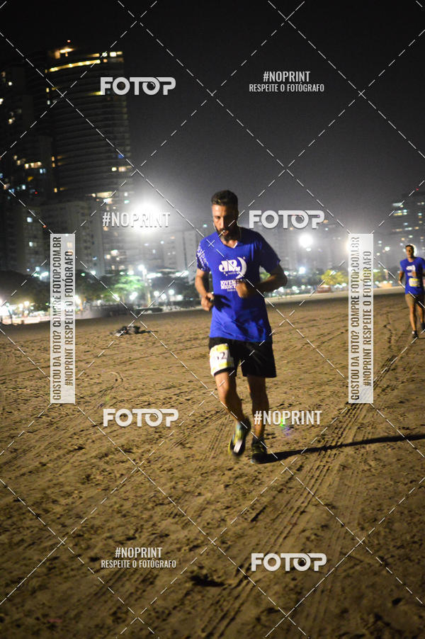 Buy your photos of the eventJovem Pan Night Run Santos on Fotop