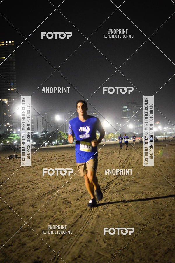 Buy your photos of the eventJovem Pan Night Run Santos on Fotop