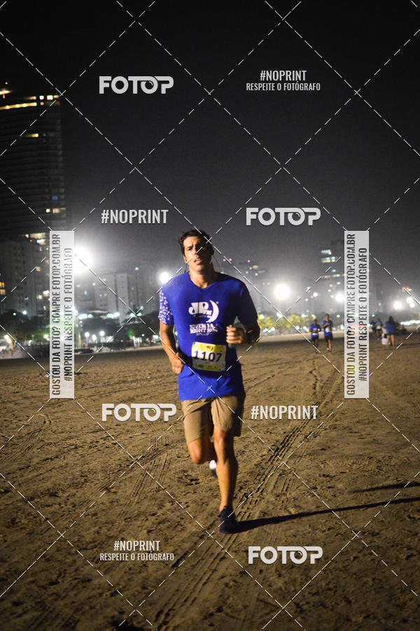 Buy your photos of the eventJovem Pan Night Run Santos on Fotop