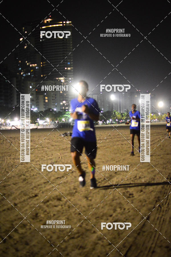 Buy your photos of the eventJovem Pan Night Run Santos on Fotop