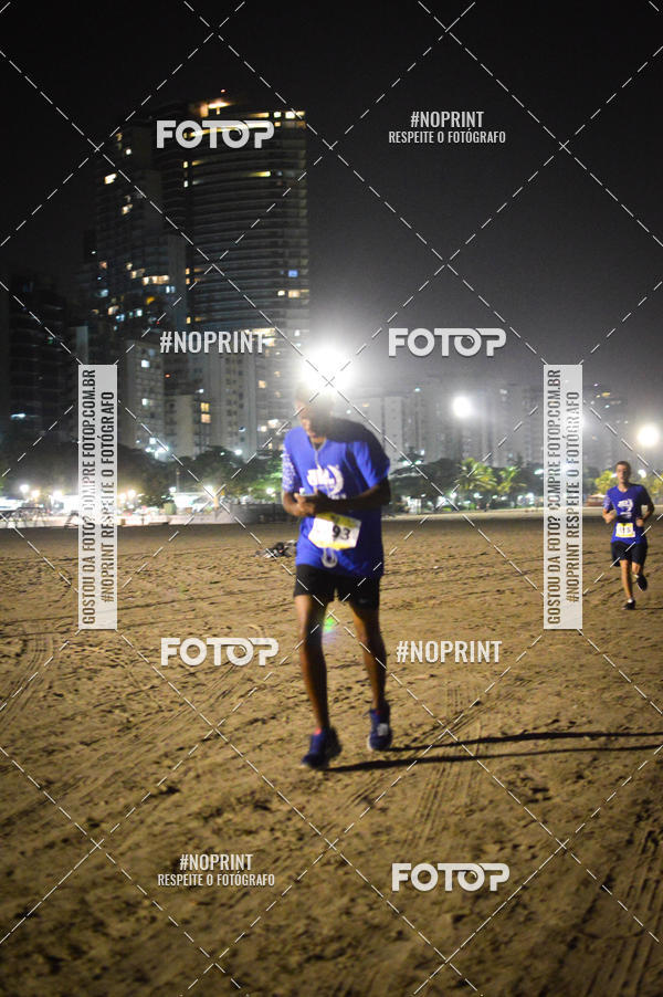 Buy your photos of the eventJovem Pan Night Run Santos on Fotop