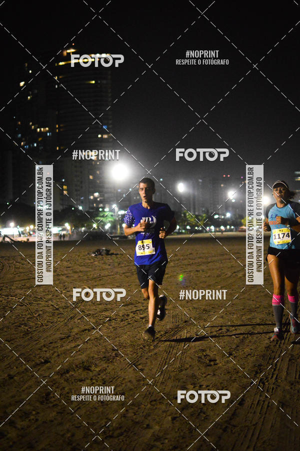 Buy your photos of the eventJovem Pan Night Run Santos on Fotop