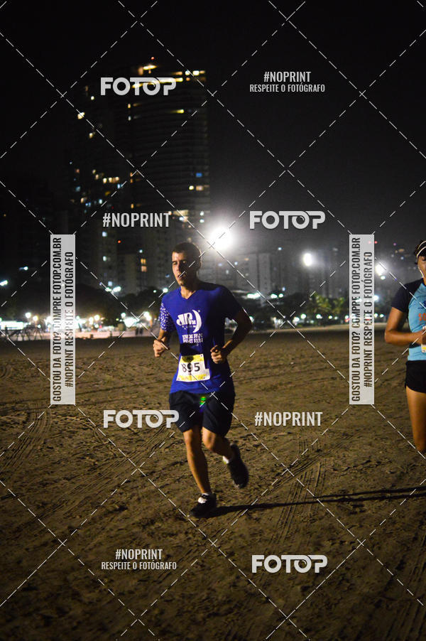 Buy your photos of the eventJovem Pan Night Run Santos on Fotop