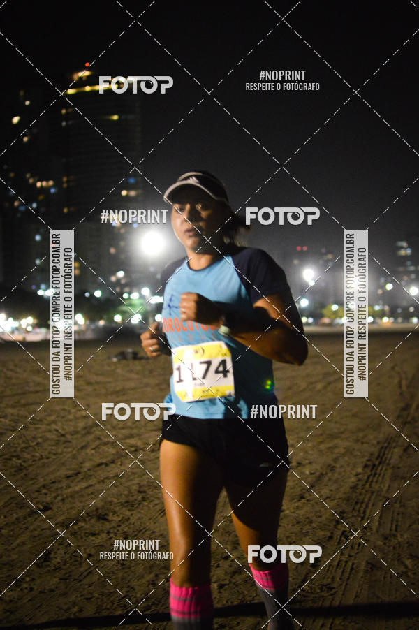 Buy your photos of the eventJovem Pan Night Run Santos on Fotop