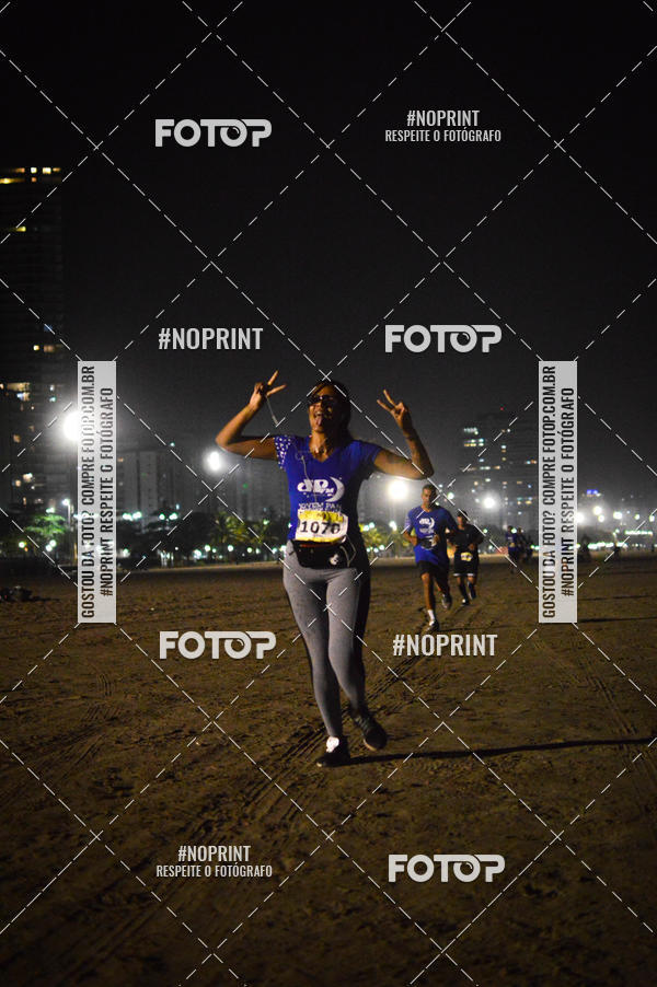 Buy your photos of the eventJovem Pan Night Run Santos on Fotop