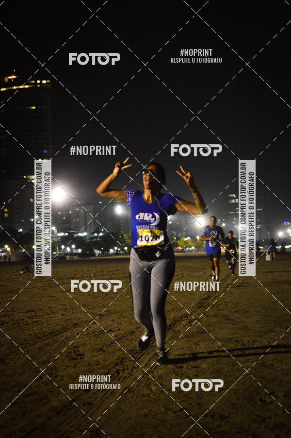 Buy your photos of the eventJovem Pan Night Run Santos on Fotop
