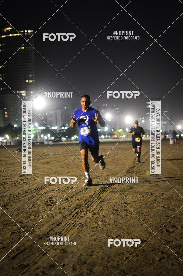 Buy your photos of the eventJovem Pan Night Run Santos on Fotop