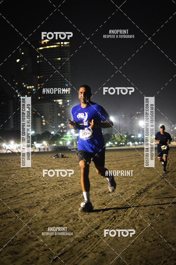 Buy your photos of the eventJovem Pan Night Run Santos on Fotop