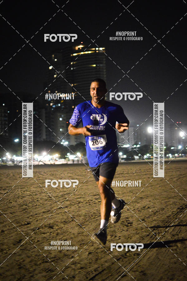 Buy your photos of the eventJovem Pan Night Run Santos on Fotop