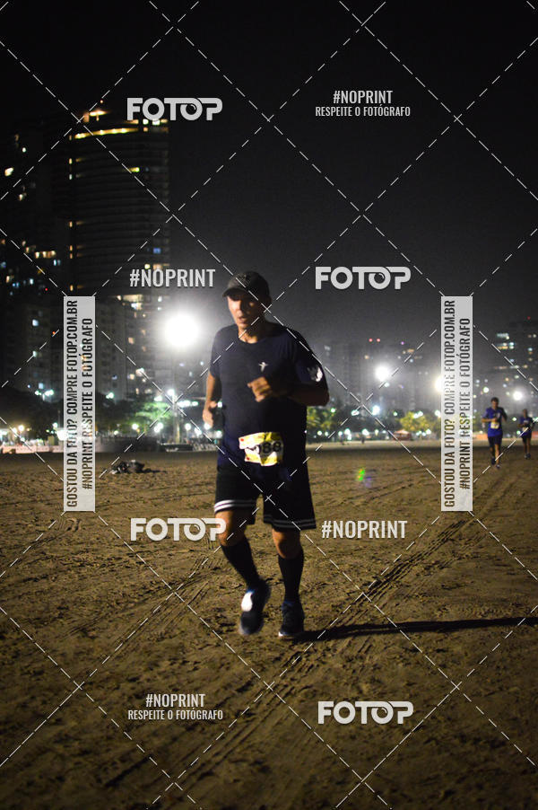 Buy your photos of the eventJovem Pan Night Run Santos on Fotop