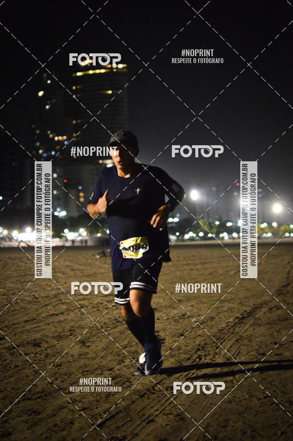 Buy your photos of the eventJovem Pan Night Run Santos on Fotop