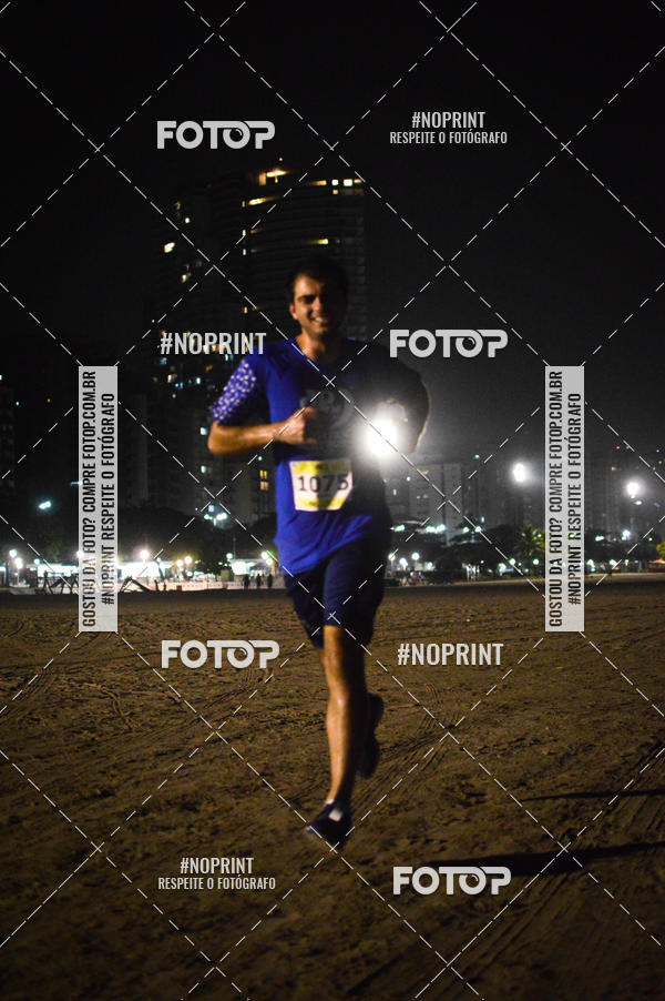 Buy your photos of the eventJovem Pan Night Run Santos on Fotop