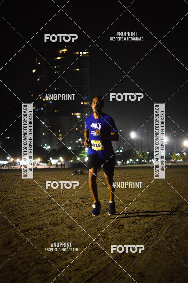Buy your photos of the eventJovem Pan Night Run Santos on Fotop
