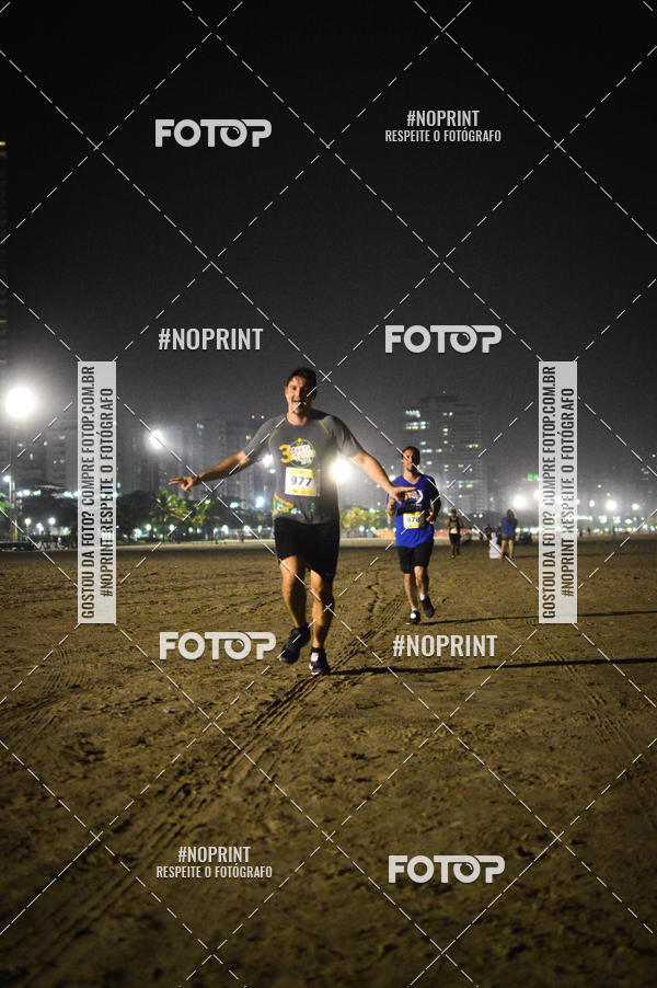 Buy your photos of the eventJovem Pan Night Run Santos on Fotop