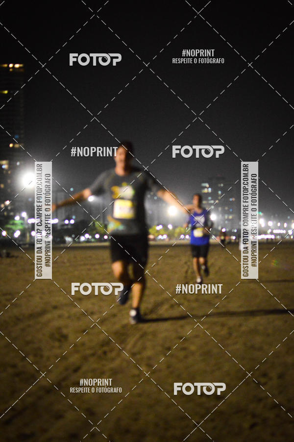 Buy your photos of the eventJovem Pan Night Run Santos on Fotop