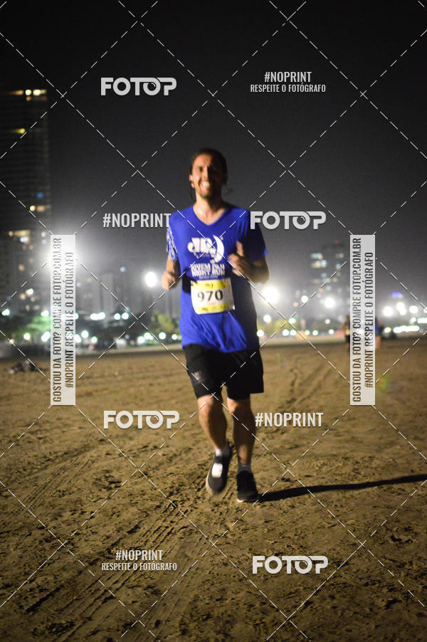 Buy your photos of the eventJovem Pan Night Run Santos on Fotop