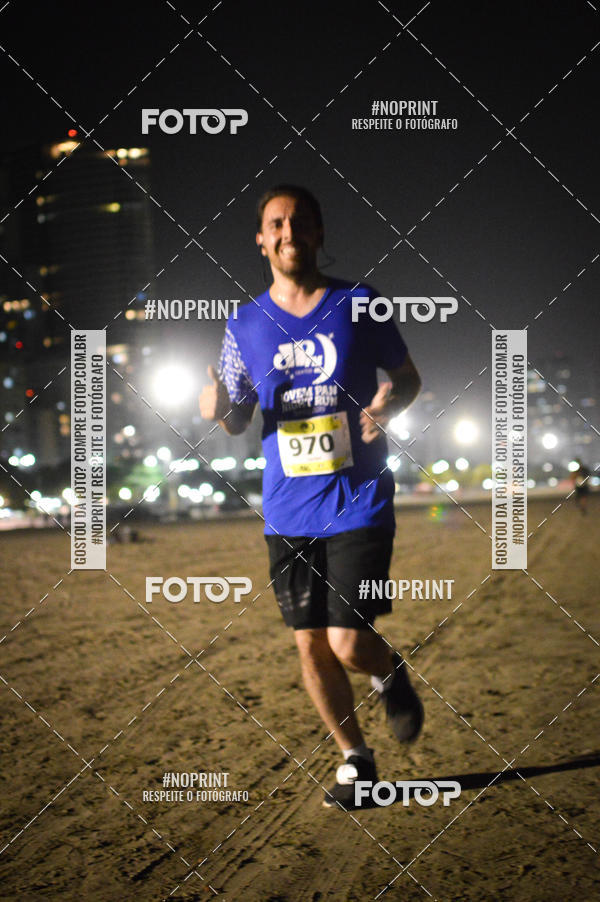 Buy your photos of the eventJovem Pan Night Run Santos on Fotop