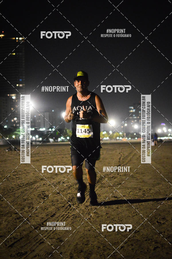 Buy your photos of the eventJovem Pan Night Run Santos on Fotop
