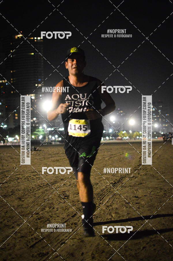 Buy your photos of the eventJovem Pan Night Run Santos on Fotop