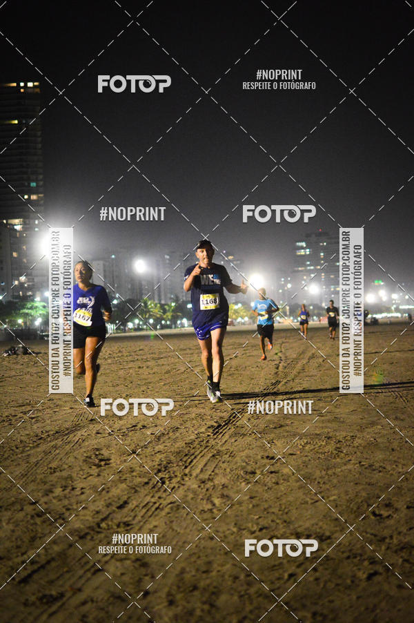 Buy your photos of the eventJovem Pan Night Run Santos on Fotop